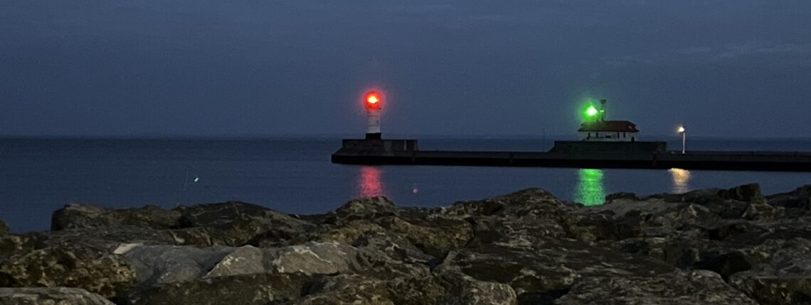 Picture of two lighthouses-ready to lead ships through a canal.